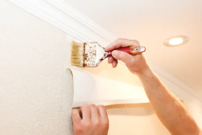 Pose de papier peint aux Sièges — revêtements muraux et toiles de verre